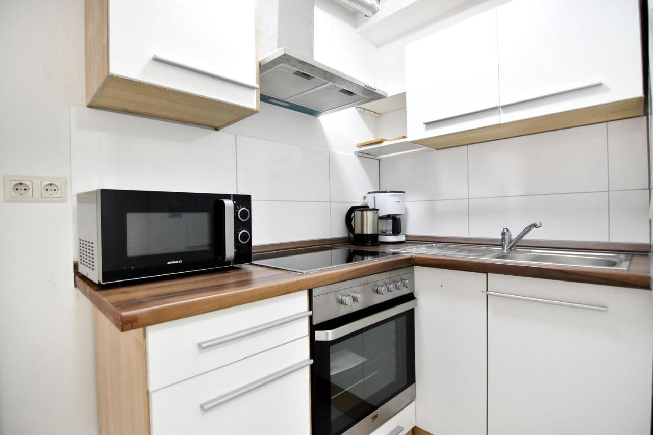 Cozy Worker Apartments Нідеркассель Екстер'єр фото